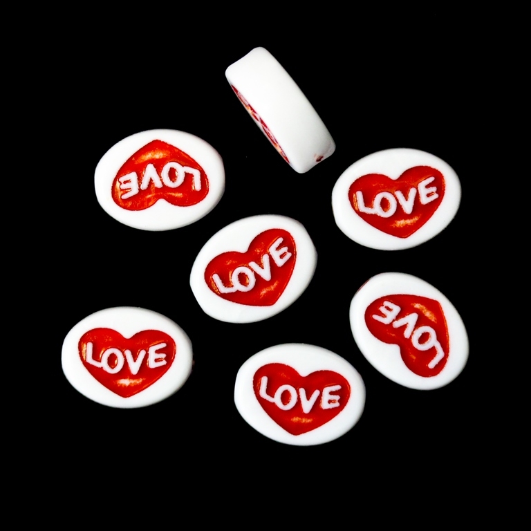 ACRYLIC BEADS - PLATE OVAL HEART WITH LOVE - 12.5x10x5mm WHITE WITH RED - PACKAGE 500g Hole-2.5mm (1100pcs.)